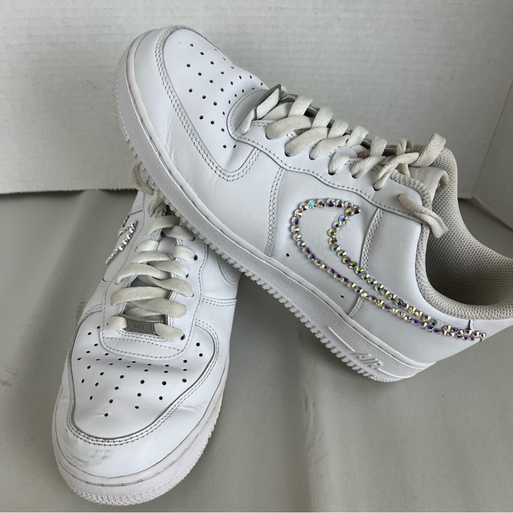 Nike White Sneakers with Silver Accents